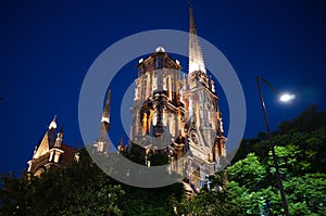 Side view of illuminated ÃÂatholic ÃÂhurch called Iglesia del Sagrado Corazon de Jesus in evening  located in Cordoba, Argentina